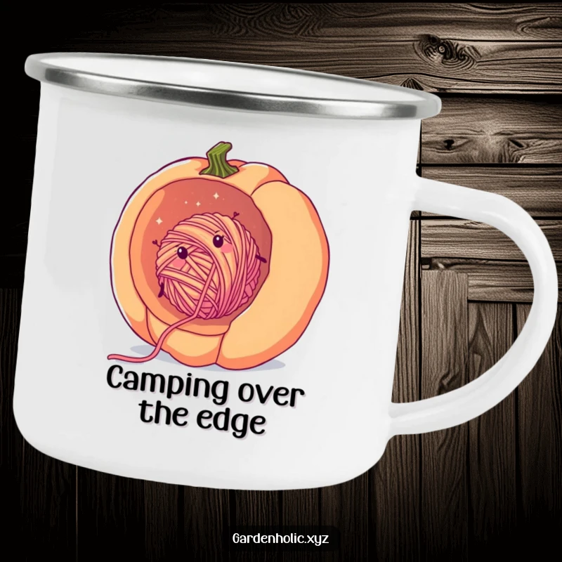 Funny yarn pumpkin camping mug showing a cheerful, fuzzy ball of yarn rolling inside a giant pumpkin, perfect for outdoor crafting.