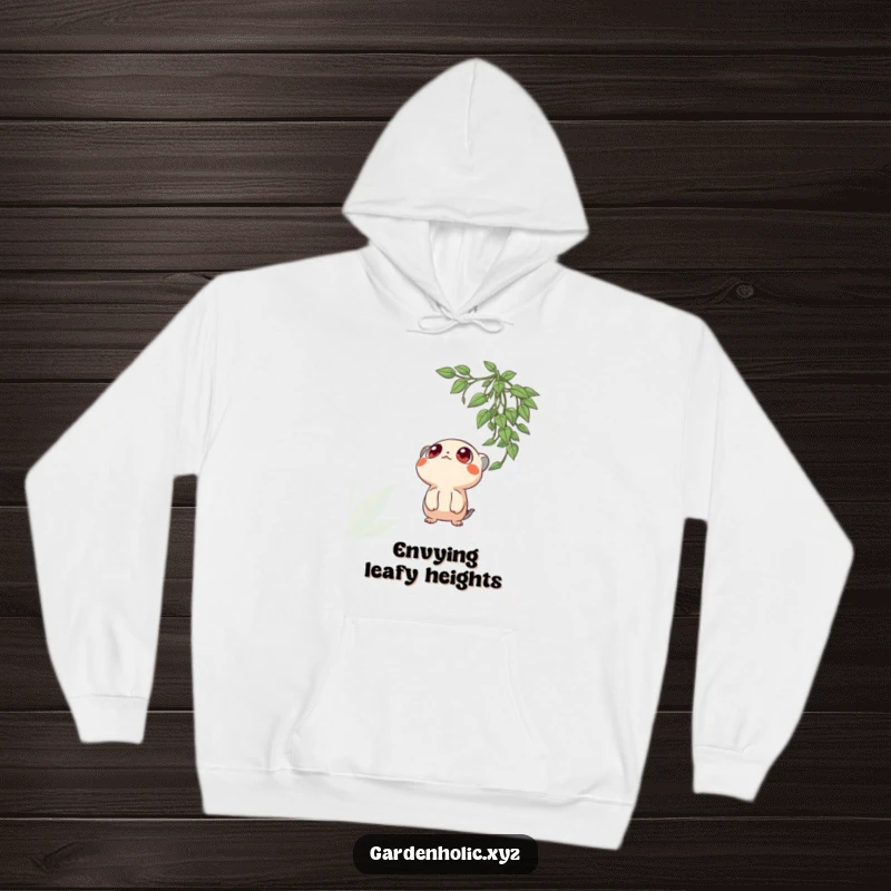 Funny hoodie showing a creature with wide, enchanted eyes looking up at a cascading hanging plant, offering cozy charm.