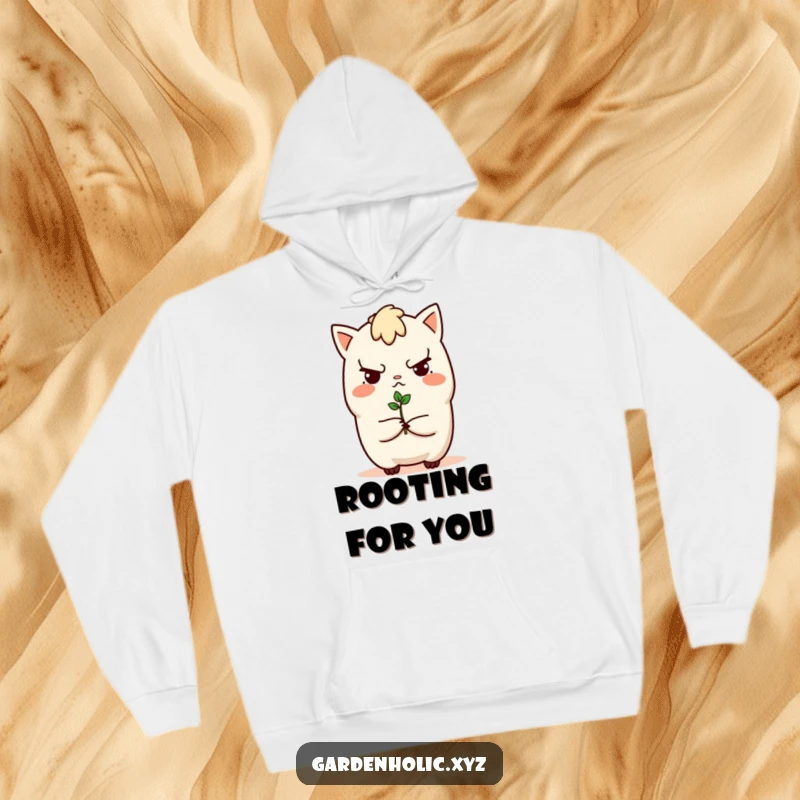 Funny hoodie showcasing a determined character presenting a small sprout, symbolizing hope and new beginnings, a cozy and funny gift for all.