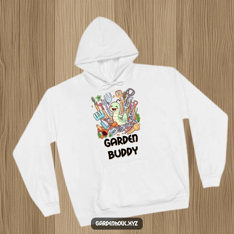 Funny hoodie with a giggling worm joyfully swimming through a pile of gardening tools, perfect for cozy garden enthusiasts.