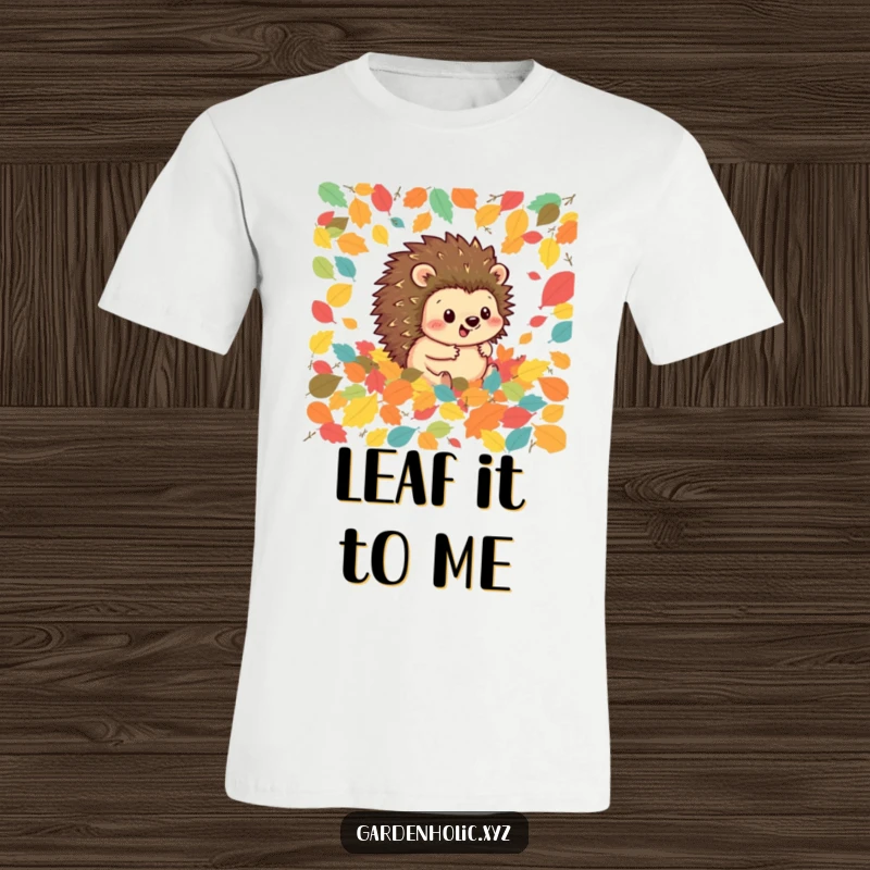 Funny hedgehog t-shirt with a happy hedgehog rolling delightedly through a large pile of colorful leaves, celebrating autumn fun.
